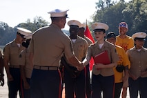 U.S. Marine Corps Sgt. Maj. Carlos A. Ruiz, the 20th Sergeant Major of the Marine Corps, alongside Brig. Gen. Ahmed T. Williamson, the Eastern Recruiting Region Commanding General, participate in a Wreath Laying Ceremony as part of Marine Week Atlanta, Atlanta, Georgia, Aug. 30, 2025. Ruiz and Williamson laid the wreath in honor of those who made the ultimate sacrifice during the Global War on Terrorism. Ruiz was also able to participate in a reenlistment ceremony following the wreath laying. (U.S. Marine Corps photo by GySgt Jordan E. Gilbert)