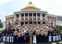U.S. Marines with Special Purpose Marine Air-Ground Task Force-250 and Governor Maura Healey, the governor of Massachusetts, pose for a group photo during Marine Week Boston, Aug. 21, 2025. Marines stationed across the globe commemorate the 250th anniversary of the Marine Corps, honoring a distinguished legacy of service, sacrifice, and unwavering fidelity to both the nation and fellow Marines. (U.S. Marine Corps photo illustration by Lance Cpl. Juaquin Greaves)