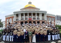 U.S. Marines with Special Purpose Marine Air-Ground Task Force-250 and Governor Maura Healey, the governor of Massachusetts, pose for a group photo during Marine Week Boston, Aug. 21, 2025. Marines stationed across the globe commemorate the 250th anniversary of the Marine Corps, honoring a distinguished legacy of service, sacrifice, and unwavering fidelity to both the nation and fellow Marines. (U.S. Marine Corps photo illustration by Lance Cpl. Juaquin Greaves)