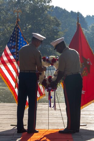 U.S. Marine Corps Brig. Gen. Ahmed T. Williamson, commanding general of Marine Corps Recruit Depot Paris Island and Eastern Recruiting Region, right, and Sgt. Maj. Carlos A. Ruiz, the 20th Sergeant Major of the Marine Corps, lay the wreath during a wreath laying ceremony held by Special Purpose Marine Air-Ground Task Force-250 at Piedmont Park during Marine Week Atlanta, Aug. 30, 2025. The solemn tribute served to commemorate Marines who made the ultimate sacrifice in defense of our nation during Operations Iraqi and Enduring Freedom. Marines stationed across the globe commemorate the 250th anniversary of the Marine Corps, honoring a distinguished legacy of service, sacrifice, and unwavering fidelity to both the nation and fellow Marines. (U.S. Marine Corps photo by Lance Cpl. Isabella Ramos)