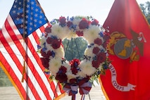 A wreath is displayed during a wreath laying ceremony held by Special Purpose Marine Air-Ground Task Force-250 at Piedmont Park during Marine Week Atlanta, Aug. 30, 2025. The solemn tribute served to commemorate Marines who made the ultimate sacrifice in defense of our nation during Operations Iraqi and Enduring Freedom. Marines stationed across the globe commemorate the 250th anniversary of the Marine Corps, honoring a distinguished legacy of service, sacrifice, and unwavering fidelity to both the nation and fellow Marines. (U.S. Marine Corps photo by Lance Cpl. Isabella Ramos)