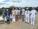 JOINT BASE PEARL HARBOR-HICKAM (Aug. 30, 2025) Sailors assigned to the USS Decatur  (DDG 73) provided ship tours for visitors to learn about their important role in maintaining readiness and ensuring national security in the Indo-Pacific region during the 80th End of World War II Commemoration on Ford Island. Hawaii families and Navy Sailors leading the tours posed for a photo before attending a tour and reflected on the enduring legacy of World War II and the significance of the commemoration. Joint Base Pearl Harbor-Hickam, in partnership with the Pearl Harbor Aviation Museum and Battleship Missouri Memorial, are hosting an 80th End of World War II Commemoration, Aug. 30-Sept. 2, on Ford Island. The free events feature military rotary wing aircraft static displays, ship tours aboard USS Decatur (DDG 73), radio-controlled model aircraft demonstrations and a performance by Gary Sinise and the Lt. Dan Band. (US Navy photo by Kyler Hood)