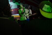 U.S. Marine Corps Sgt. Elizabeth Marino,(Left) a vocalist, and Cpl. Noel Jabari a guitarist, with the 2D Marine Aircraft Wing Band with the popular music group, assigned to Special Purpose Marine Air-Ground Task Force-250 perform at Cobb County, Georgia during Marine Week Atlanta, Aug. 30, 2025. Marines stationed across the globe commemorate the 250th anniversary of the Marine Corps, honoring a distinguished legacy of service, sacrifice, and unwavering fidelity to both the nation and the Corps. (U.S. Marine Corps photo by Lance Cpl. Steven Wells)