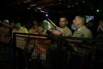 U.S. Marines assigned to Special Purpose Marine Air-Ground Task Force-250 and civilians watch a performance from the 2D Marine Aircraft Wing Band with the popular music group, at Cobb County, Georgia during Marine Week Atlanta, Aug. 30, 2025. Marines stationed across the globe commemorate the 250th anniversary of the Marine Corps, honoring a distinguished legacy of service, sacrifice, and unwavering fidelity to both the nation and the Corps. (U.S. Marine Corps photo by Lance Cpl. Steven Wells)