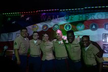 U.S. Marine Corps 2D Marine Aircraft Wing Band with the popular music group, assigned to Special Purpose Marine Air-Ground Task Force-250 pose for a photo at Cobb County, Georgia during Marine Week Atlanta, Aug. 30, 2025. Marines stationed across the globe commemorate the 250th anniversary of the Marine Corps, honoring a distinguished legacy of service, sacrifice, and unwavering fidelity to both the nation and the Corps. (U.S. Marine Corps photo by Lance Cpl. Steven Wells)