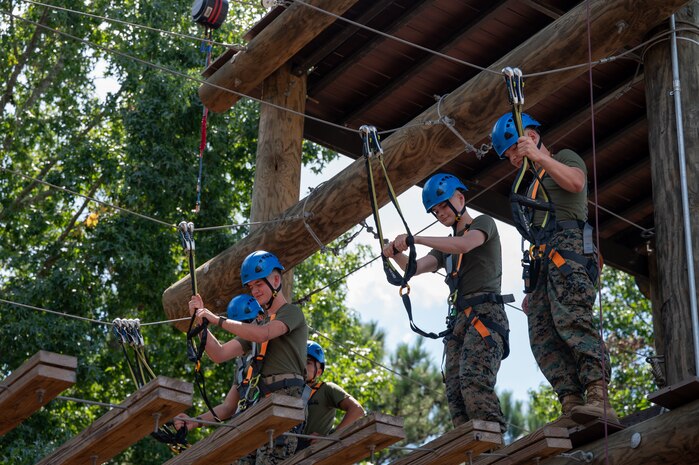 U.S. Marines assigned to Combat Logistics Regiment 45, take part in the confidence course at Camp Southern Ground during Marine Week Atlanta, Aug. 30, 2025. Marines stationed across the globe commemorate the 250th anniversary of the Marine Corps, honoring a distinguished legacy of the service, sacrifice, and unwavering fidelity to both the nation and fellow Marines. (U.S. Marine Corps photo by Lance Cpl. Matthew A. McDonnell)