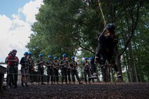 U.S. Marines assigned to Combat Logistics Regiment 45, take part in the confidence course at Camp Southern Ground during Marine Week Atlanta, Aug. 30, 2025. Marines stationed across the globe commemorate the 250th anniversary of the Marine Corps, honoring a distinguished legacy of the service, sacrifice, and unwavering fidelity to both the nation and fellow Marines. (U.S. Marine Corps photo by Lance Cpl. Matthew A. McDonnell)