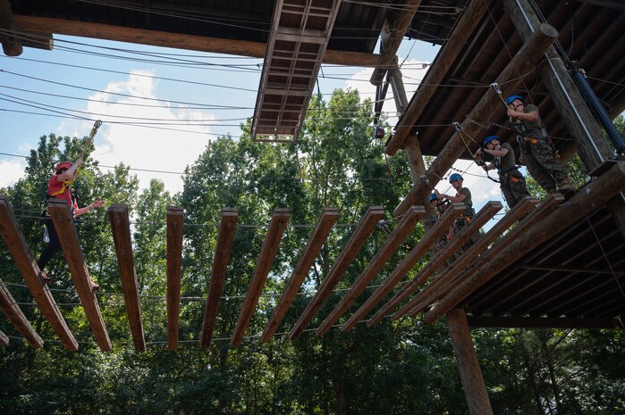 U.S. Marines assigned to Combat Logistics Regiment 45, take part in the confidence course at Camp Southern Ground during Marine Week Atlanta, Aug. 30, 2025. Marines stationed across the globe commemorate the 250th anniversary of the Marine Corps, honoring a distinguished legacy of the service, sacrifice, and unwavering fidelity to both the nation and fellow Marines. (U.S. Marine Corps photo by Lance Cpl. Matthew A. McDonnell)