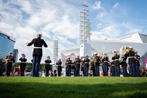 The 2D Marine Aircraft Wing Band plays for the crowd in Atlanta, Georgia during Marine Week Atlanta, Aug. 30, 2025. Marines stationed across the globe commemorate the 250th anniversary of the Marine Corps, honoring a distinguished legacy of service, sacrifice, and unwavering fidelity to both the nation and the Corps. (U.S. Marine Corps photo by Sgt. Alexis French)