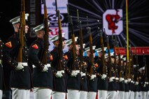 U.S. Marines with the United States Marine Corps Silent Drill Platoon execute their "long line" sequence during a half-time performance at a Gainesville High School football game during Marine Week Atlanta in Gainesville, Ga., Aug. 29, 2025. The year 2025 marks the 250th anniversary of the United States Marine Corps, a milestone that highlights the legacy, transformation and enduring spirit of the Corps since 1775. Throughout the year, Marines across the globe will commemorate this anniversary by honoring the service and sacrifice of those who served before them and by remaining faithful to the motto Semper Fidelis. (U.S. Marine Corps photo by Cpl. Christopher Prelle)