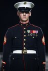 U.S. Marine Corps Sgt. William Buffington, rifle inspector, United States Marine Corps Silent Drill Platoon, stands at attention during a half-time performance at a Gainesville High School football game during Marine Week Atlanta in Gainesville, Ga., Aug. 29, 2025. The year 2025 marks the 250th anniversary of the United States Marine Corps, a milestone that highlights the legacy, transformation and enduring spirit of the Corps since 1775. Throughout the year, Marines across the globe will commemorate this anniversary by honoring the service and sacrifice of those who served before them and by remaining faithful to the motto Semper Fidelis. (U.S. Marine Corps photo by Cpl. Christopher Prelle)