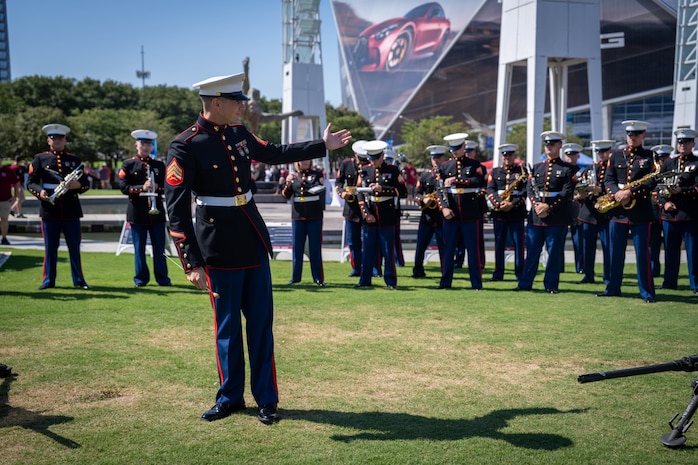 U.S. Marine Corps Sgt. Taylor Brown, a musician with the 2D Marine Aircraft Wing Band, assigned to Special Purpose Marine Air-Ground Task Force-250, introduces his ensemble during Marine Week Atlanta, Aug. 31, 2025. Marines stationed across the globe commemorate the 250th anniversary of the Marine Corps, honoring a distinguished legacy of service, sacrifice, and unwavering fidelity to both the nation and fellow Marines. (U.S. Marine Corps photo by Sgt. Alfonso Livrieri)