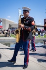 A U.S. Marine with the 2D Marine Aircraft Wing Band, assigned to Special Purpose Marine Air-Ground Task Force-250, plays the saxophone during Marine Week Atlanta, Aug. 31, 2025. Marines stationed across the globe commemorate the 250th anniversary of the Marine Corps, honoring a distinguished legacy of service, sacrifice, and unwavering fidelity to both the nation and fellow Marines. (U.S. Marine Corps photo by Sgt. Alfonso Livrieri)