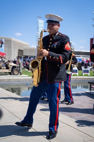 A U.S. Marine with the 2D Marine Aircraft Wing Band, assigned to Special Purpose Marine Air-Ground Task Force-250, plays the saxophone during Marine Week Atlanta, Aug. 31, 2025. Marines stationed across the globe commemorate the 250th anniversary of the Marine Corps, honoring a distinguished legacy of service, sacrifice, and unwavering fidelity to both the nation and fellow Marines. (U.S. Marine Corps photo by Sgt. Alfonso Livrieri)