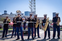 U.S. Marines with the 2D Marine Aircraft Wing Band, assigned to Special Purpose Marine Air-Ground Task Force-250, perform a music show during Marine Week Atlanta, Aug. 31, 2025. Marines stationed across the globe commemorate the 250th anniversary of the Marine Corps, honoring a distinguished legacy of service, sacrifice, and unwavering fidelity to both the nation and fellow Marines. (U.S. Marine Corps photo by Sgt. Alfonso Livrieri)