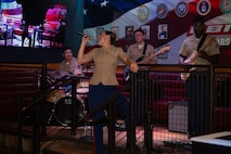 U.S. Marine Corps 2D Marine Aircraft Wing Band with the popular music group, assigned to Special Purpose Marine Air-Ground Task Force-250 perform at Cobb County, Georgia during Marine Week Atlanta, Aug. 30, 2025. Marines stationed across the globe commemorate the 250th anniversary of the Marine Corps, honoring a distinguished legacy of service, sacrifice, and unwavering fidelity to both the nation and the Corps. (U.S. Marine Corps photo by Lance Cpl. Steven Wells)
