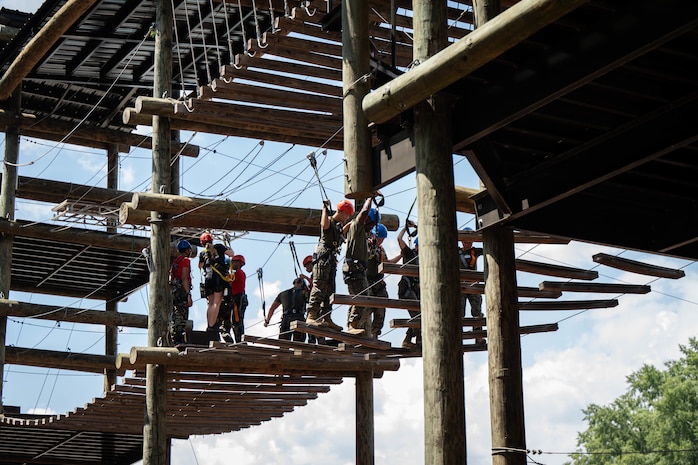 U.S. Marines assigned to Special Purpose Marine Air-Ground Task Force 250 take part in the confidence course at Camp Southern Ground, Fayetteville, Georgia during Marine Week Atlanta, Aug. 30, 2025. Marines stationed across the globe commemorate the 250th anniversary of the Marine Corps, honoring a distinguished legacy of service, sacrifice, and unwavering fidelity to both the nation and the Corps. (U.S. Marine Corps photo by Sgt. Alexis French)