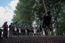 U.S. Marines assigned to Combat Logistics Regiment 45, take part in the confidence course at Camp Southern Ground during Marine Week Atlanta, Aug. 30, 2025. Marines stationed across the globe commemorate the 250th anniversary of the Marine Corps, honoring a distinguished legacy of the service, sacrifice, and unwavering fidelity to both the nation and fellow Marines. (U.S. Marine Corps photo by Lance Cpl. Matthew A. McDonnell)