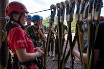 U.S. Marines assigned to Combat Logistics Regiment 45, take part in the confidence course at Camp Southern Ground during Marine Week Atlanta, Aug. 30, 2025. Marines stationed across the globe commemorate the 250th anniversary of the Marine Corps, honoring a distinguished legacy of the service, sacrifice, and unwavering fidelity to both the nation and fellow Marines. (U.S. Marine Corps photo by Lance Cpl. Matthew A. McDonnell)
