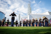 The 2D Marine Aircraft Wing Band plays for the crowd in Atlanta, Georgia during Marine Week Atlanta, Aug. 30, 2025. Marines stationed across the globe commemorate the 250th anniversary of the Marine Corps, honoring a distinguished legacy of service, sacrifice, and unwavering fidelity to both the nation and the Corps. (U.S. Marine Corps photo by Sgt. Alexis French)