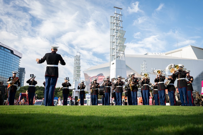 The 2D Marine Aircraft Wing Band plays for the crowd in Atlanta, Georgia during Marine Week Atlanta, Aug. 30, 2025. Marines stationed across the globe commemorate the 250th anniversary of the Marine Corps, honoring a distinguished legacy of service, sacrifice, and unwavering fidelity to both the nation and the Corps. (U.S. Marine Corps photo by Sgt. Alexis French)