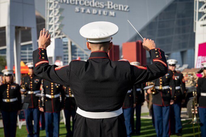 The 2D Marine Aircraft Wing Band performs at the Marine Week Atlanta static display in Atlanta, Georgia during Marine Week Atlanta, Aug. 30, 2025. Marines stationed across the globe commemorate the 250th anniversary of the Marine Corps, honoring a distinguished legacy of service, sacrifice, and unwavering fidelity to both the nation and the Corps. (U.S. Marine Corps photo by Sgt. Alexis French)