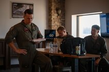 U.S. Marines with 2nd Marine Aircraft Wing, assigned to Special Purpose Marine Air-Ground Task Force 250, attend a meeting prior to takeoff at Cobb County International Airport, Kennesaw, Georgia, during Marine Week Atlanta, Aug. 31, 2025. Marines stationed across the globe commemorate the 250th anniversary of the Marine Corps, honoring a distinguished legacy of service, sacrifice, and unwavering fidelity to both the nation and the Corps. (U.S. Marine Corps photo by Sgt. Alexis French)