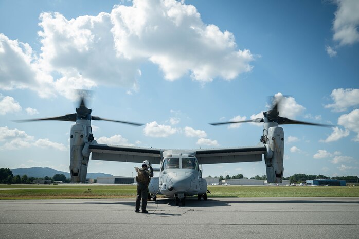 U.S. Marines Corps Cpl. Gavin McSwain, an MV-22 Osprey crew chief with 2nd Marine Aircraft Wing assigned to Special Purpose Marine Air-Ground Task Force 250, conducts pre-flight checks prior to takeoff at Cobb County International Airport, Kennesaw, Georgia during Marine Week Atlanta, Aug. 31, 2025. Marines stationed across the globe commemorate the 250th anniversary of the Marine Corps, honoring a distinguished legacy of service, sacrifice, and unwavering fidelity to both the nation and the Corps. (U.S. Marine Corps photo by Sgt. Alexis French)