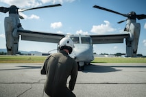 U.S. Marines Corps Cpl. Gavin McSwain, an MV-22 Osprey crew chief with 2nd Marine Aircraft Wing assigned to Special Purpose Marine Air-Ground Task Force 250, conducts pre-flight checks prior to takeoff at Cobb County International Airport, Kennesaw, Georgia, during Marine Week Atlanta, Aug. 31, 2025. Marines stationed across the globe commemorate the 250th anniversary of the Marine Corps, honoring a distinguished legacy of service, sacrifice, and unwavering fidelity to both the nation and the Corps. (U.S. Marine Corps photo by Sgt. Alexis French)