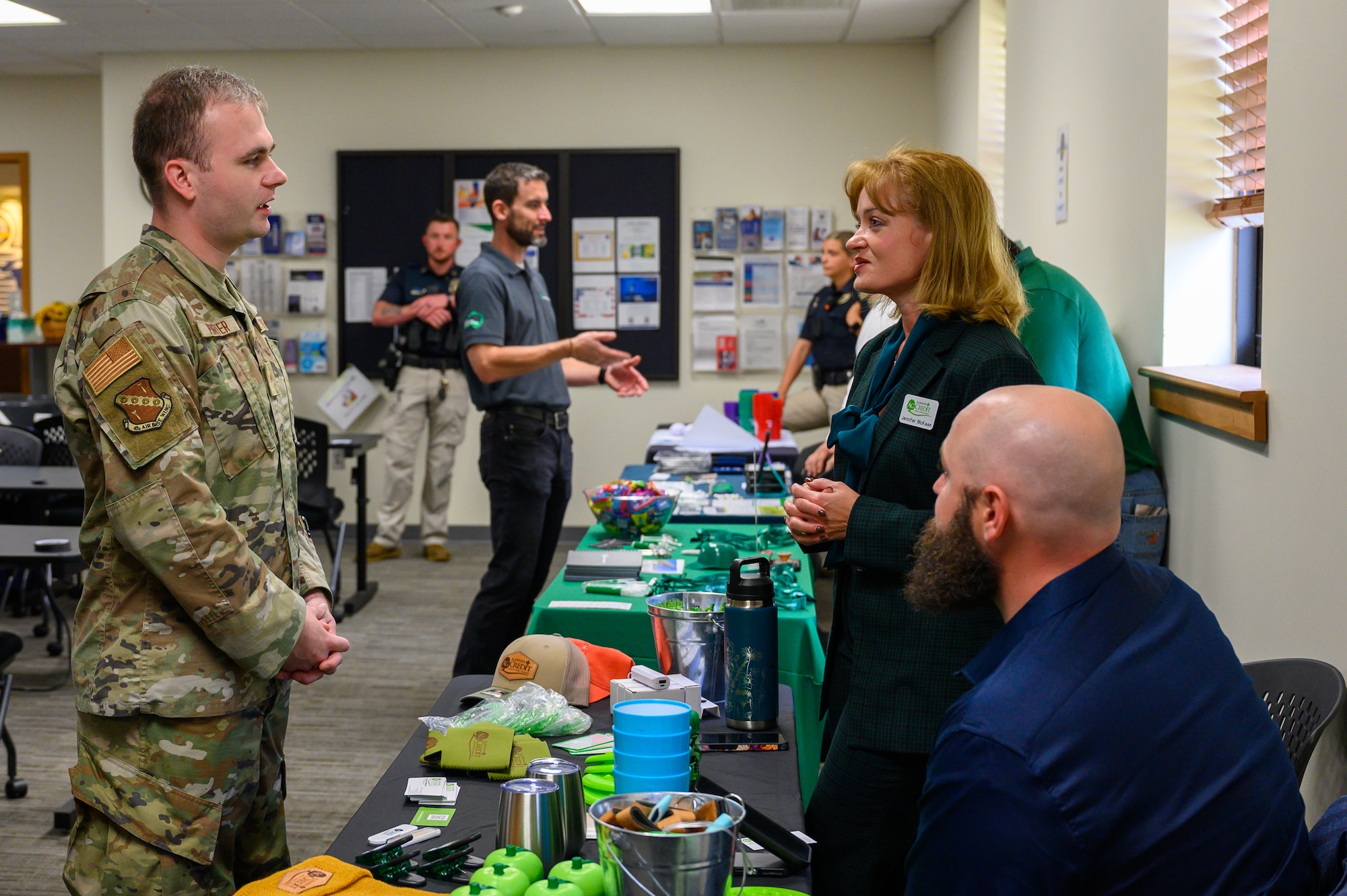 Senior Airman Evan Porter, 42d Air Base Wing Public Affairs journeyman, speaks with representatives from Alabama Ag Credit at the Military and Family Readiness Center career fair at Maxwell Air Force Base, Alabama, Nov. 25, 2025. The quarterly M&FRC career fairs help Airmen separating from the U.S. Air Force find employment at local companies and government agencies. (U.S. Air Force photo by Senior Airman Evan Lichtenhan)