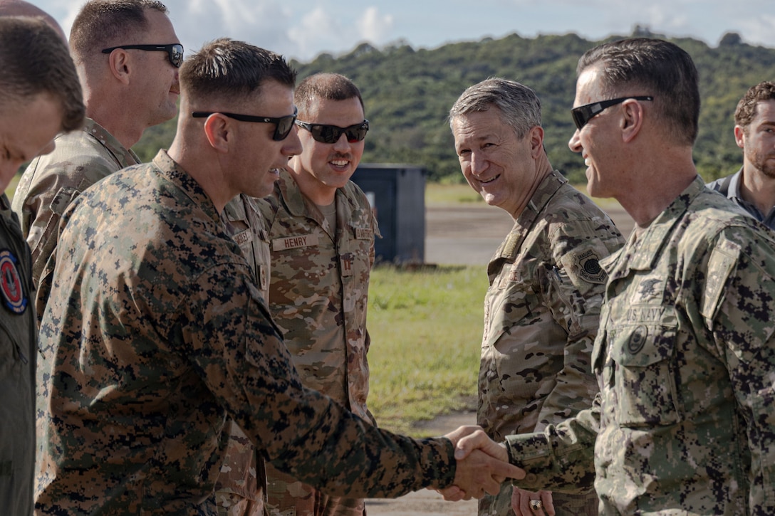 Senior Enlisted Advisor to the Chairman, David L. Isom greets the Command Senior Enlisted Leader of Marine Fighter Attack Squadron (VMFA) 225, U.S. Marine Corps Forces, South, at Jose Aponte de la Torre Airport in Ceiba, Puerto Rico, Nov. 24, 2025. U.S. military forces are deployed to the Caribbean in support of the U.S. Southern Command mission, Department of War-directed operations, and the president’s priorities to disrupt illicit drug trafficking and protect the homeland. (U.S. Marine Corps photo)