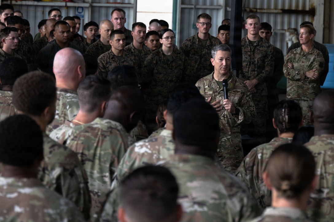 Chairman of the Joint Chiefs of Staff Gen. Dan Caine speaks to U.S. Marines with Marine Fighter Attack Squadron (VMFA) 225, U.S. Marine Corps Forces, South, and U.S. Airmen with the 346th Air Expeditionary Wing at Jose Aponte de la Torre Airport in Ceiba, Puerto Rico, Nov. 24, 2025. U.S. military forces are deployed to the Caribbean in support of the U.S. Southern Command mission, Department of War-directed operations, and the president’s priorities to disrupt illicit drug trafficking and protect the homeland. (U.S. Marine Corps photo)