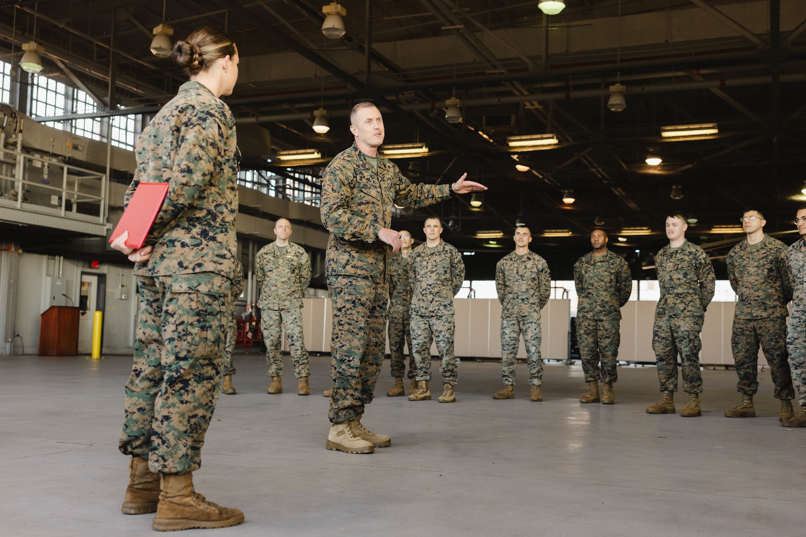 U.S. Marine Corps Sgt. Maj. Liam Williams, sergeant major of Marine Corps Base Quantico, addresses the audience during Sgt. Kayli Merritt’s, an expeditionary firefighting and rescue specialist with Marine Corps Air Facility, meritorious promotion to sergeant at MCAF, on MCB Quantico, Virginia, Nov. 24, 2025. A meritorious promotion is based on the individual Marines ability to take on the responsibilities and duties of a higher grade in an effective manner. (U.S. Marine Corps photo by Lance Cpl. Harleigh Faulk)