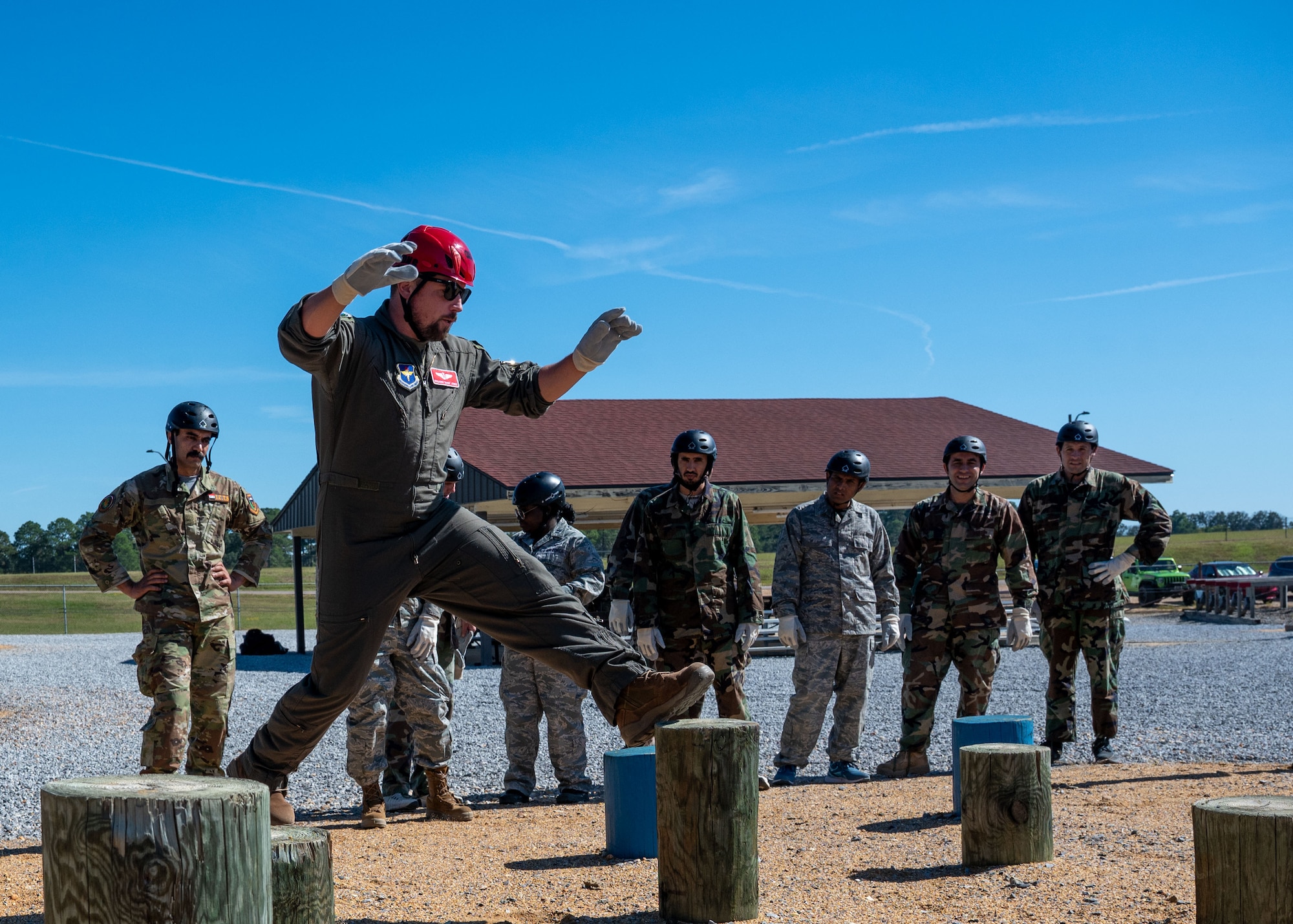 International Officer School students navigate an obstacle course during a preparatory course training session at Maxwell Air Force Base, Alabama, Oct. 22, 2025.