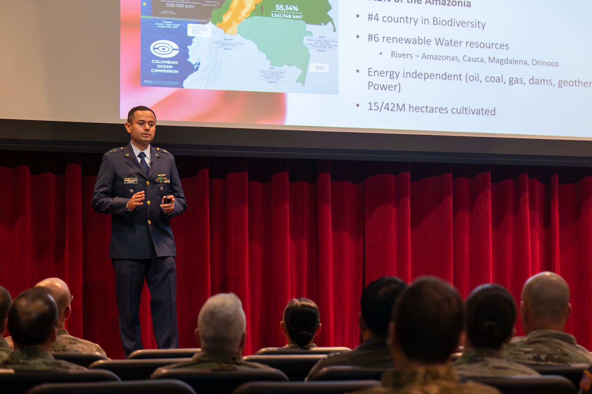 Colombian Air Force Lt. Col. Juan Cardenas, Directorate of Science and Technology, Headquarters of Aeronautical and Space Education Air War College student, delivers a presentation on Colombia’s national security challenges during a cultural briefing at Maxwell Air Force Base, Alabama, Oct. 22, 2025.