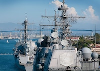 SAN DIEGO, Calif. – The Arleigh Burke-class guided missile destroyer USS Wayne E. Meyer (DDG 108), the Ticonderoga-class guided missile cruiser USS Cape St. George (CG 71) and the San Antonio-class amphibious transport dock ship USS Somerset (LPD 25) opened for public tours at North Island Lima Pier during the Coronado Speed Festival as part of Fleet Week 2015. Cape St. George, a Ticonderoga-class guided missile cruiser, is equipped with four AN/SPG-62 Fire Control Radars. Two of these radars are located at the front of the vessel, on the port and starboard sides, while the other two are positioned at the aft superstructure, also on the port and starboard sides. (U.S. Navy photo by Mass Communications Specialist 1st Class Vladimir Ramos)