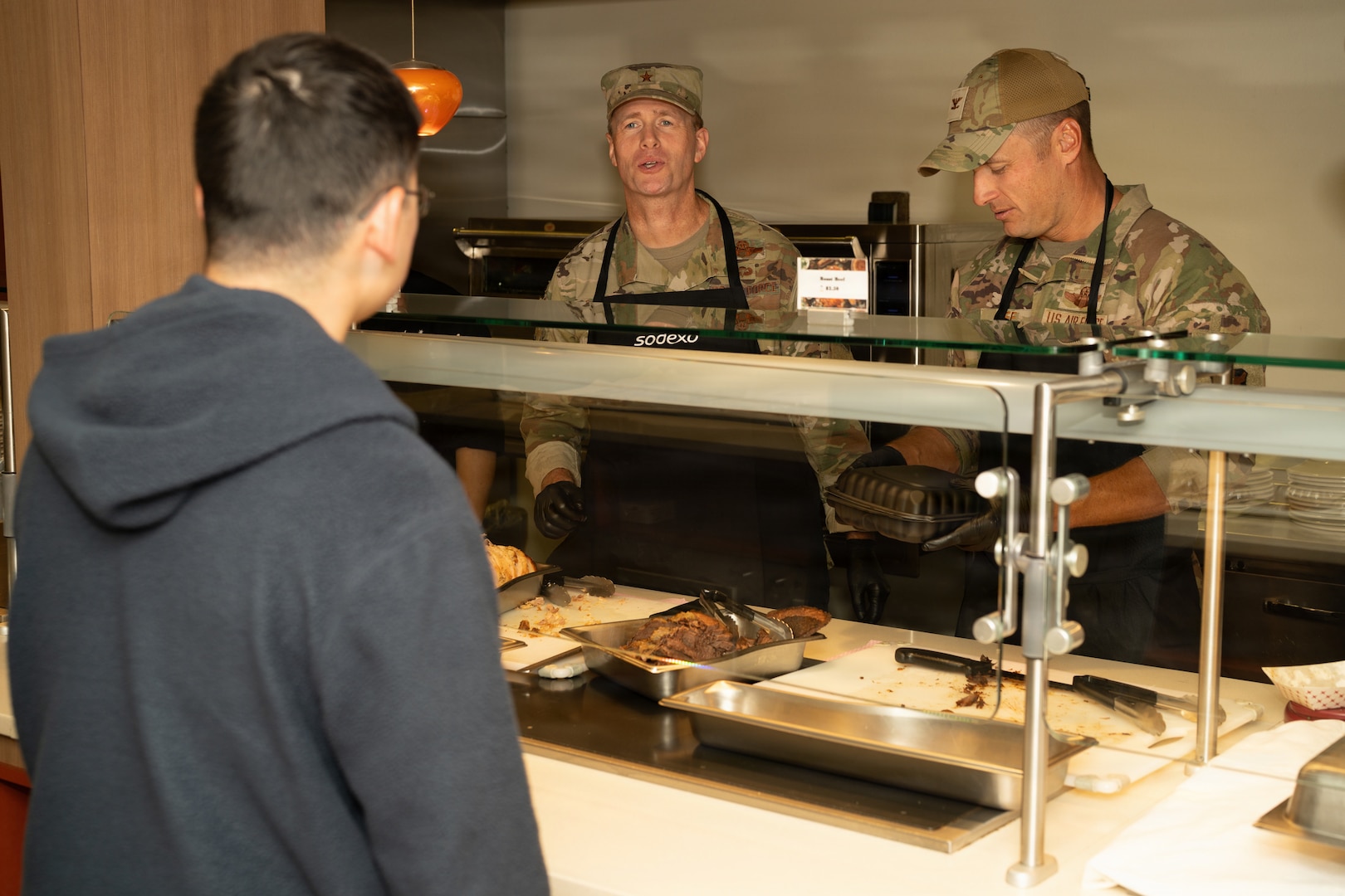 JBSA Senior Leaders Serve Holiday Spirit with a Side of Turkey at Wingman Café