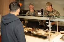 JBSA Senior Leaders Serve Holiday Spirit with a Side of Turkey at Wingman Café