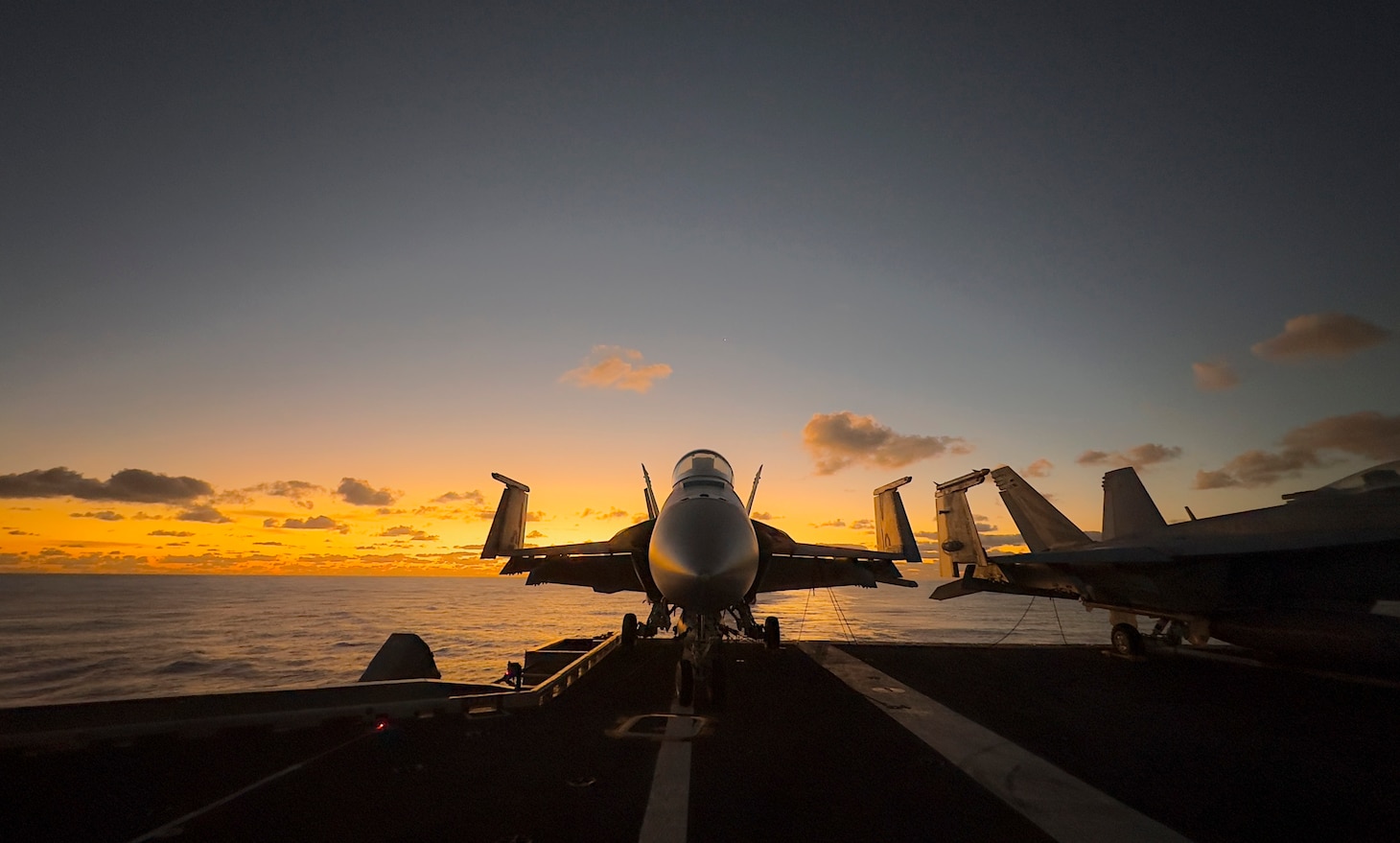 F/A-18F Super Hornets, assigned to the “Black Knights” of Strike Fighter Squadron (VFA) 154, line the flight deck of the Nimitz-class aircraft carrier USS Theodore Roosevelt (CVN 71), Jan. 25, 2024. Theodore Roosevelt, flagship of Carrier Strike Group Nine, is underway conducting routine operations in the U.S. 7th Fleet area of operations. An integral part of U.S. Pacific Fleet, U.S. 7th Fleet operates naval forces in the Indo-Pacific and provides the realistic, relevant training necessary to execute the U.S. Navy’s role across the full spectrum of military operations – from combat operations to humanitarian assistance and disaster relief. U.S. 7th Fleet works together with our allies and partners to advance freedom of navigation, the rule of law, and other principles that underpin security for the Indo-Pacific region.