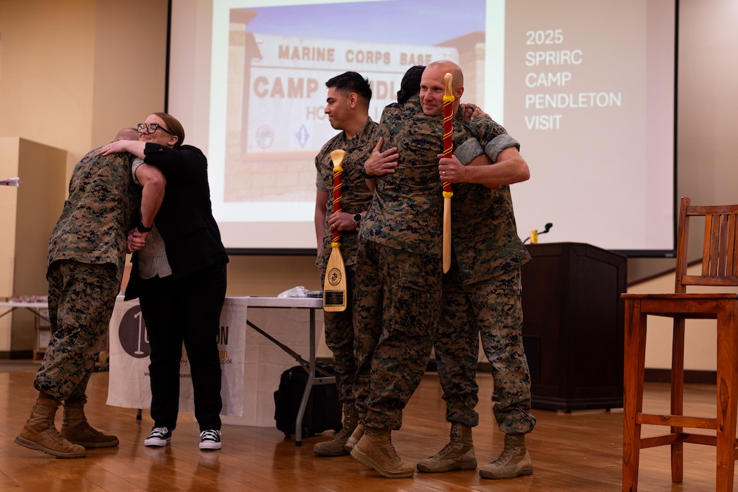 U.S. Marines at the 2025 Suicide Prevention and Response Independent Review Committee receive the Prevention Program of the Year award at Marine Corps Base Camp Pendleton, California, Aug. 6, 2025.