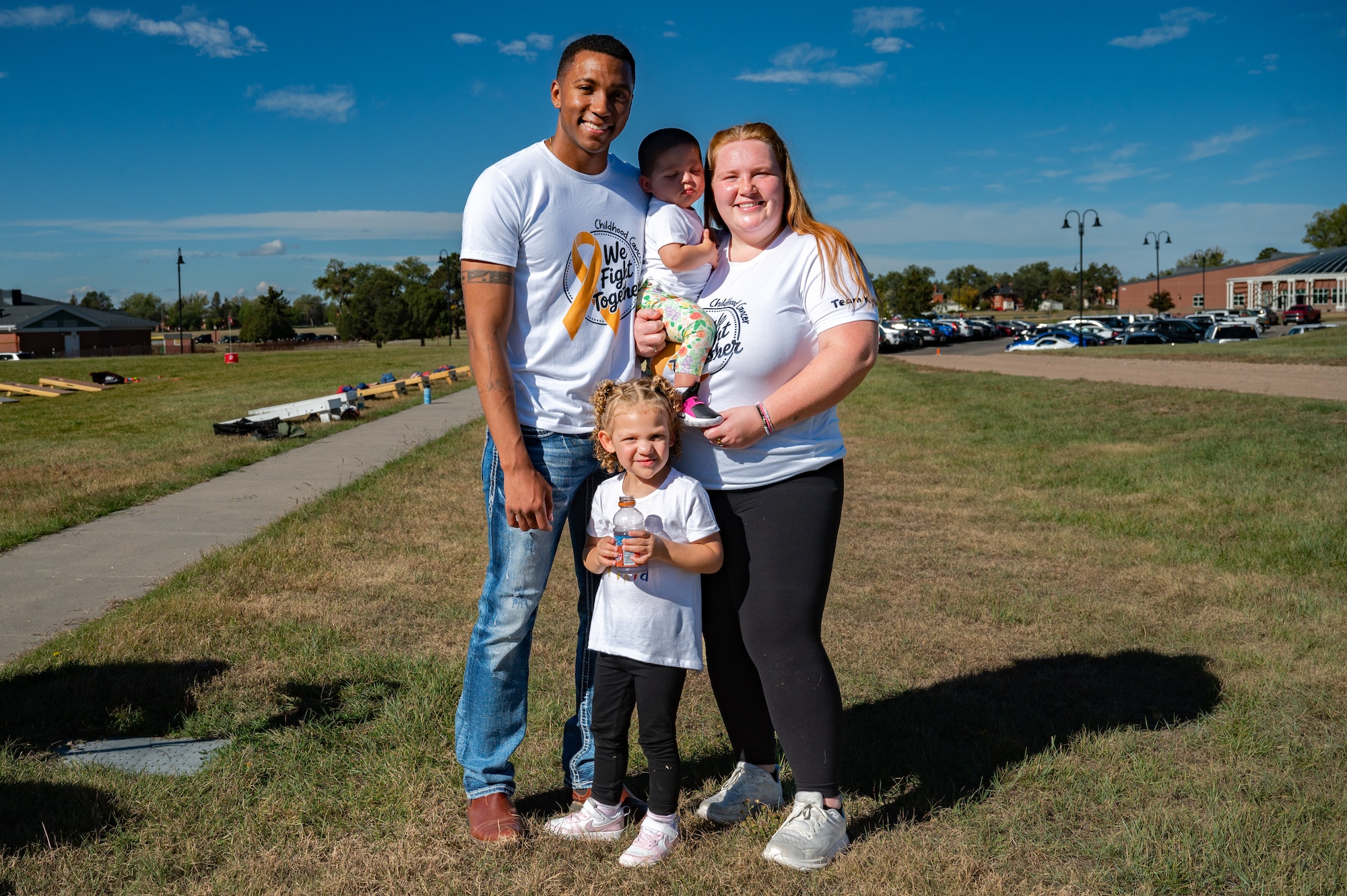The 90th Missile Maintenance Squadron, along with 90 FSS, hosted a 5K to show support for Senior Airman Terrell Johnson’s daughter who recently beat cancer, participants were encouraged to wear yellow or dress as their favorite superhero. (U.S. Air Force photo by Airman Nicholas Rowe)