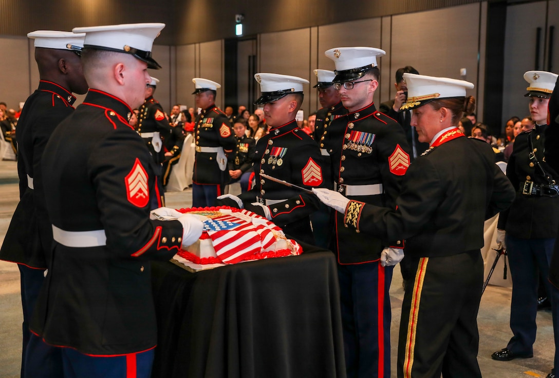 U.S. Marine Corps Maj. Gen. Valerie A. Jackson, commander of United States Marine Corps Forces, Korea, cuts the ceremonial cake using a Mameluke Sword during MARFORK’s 250th Marine Corps birthday ball in Seoul, South Korea, Nov. 21, 2025. Founded on November 10, 1775, the United States Marine Corps has served our nation honorably in every clime and place for 250 years. Throughout 2025, Marines across the globe will celebrate the 250th birthday of the Corps, commemorating service, sacrifice, and priding themselves on living ‘Semper Fidelis’ or ‘Always Faithful’ to their nation and to each other. (U.S. Army photo by PFC Oh Dong)