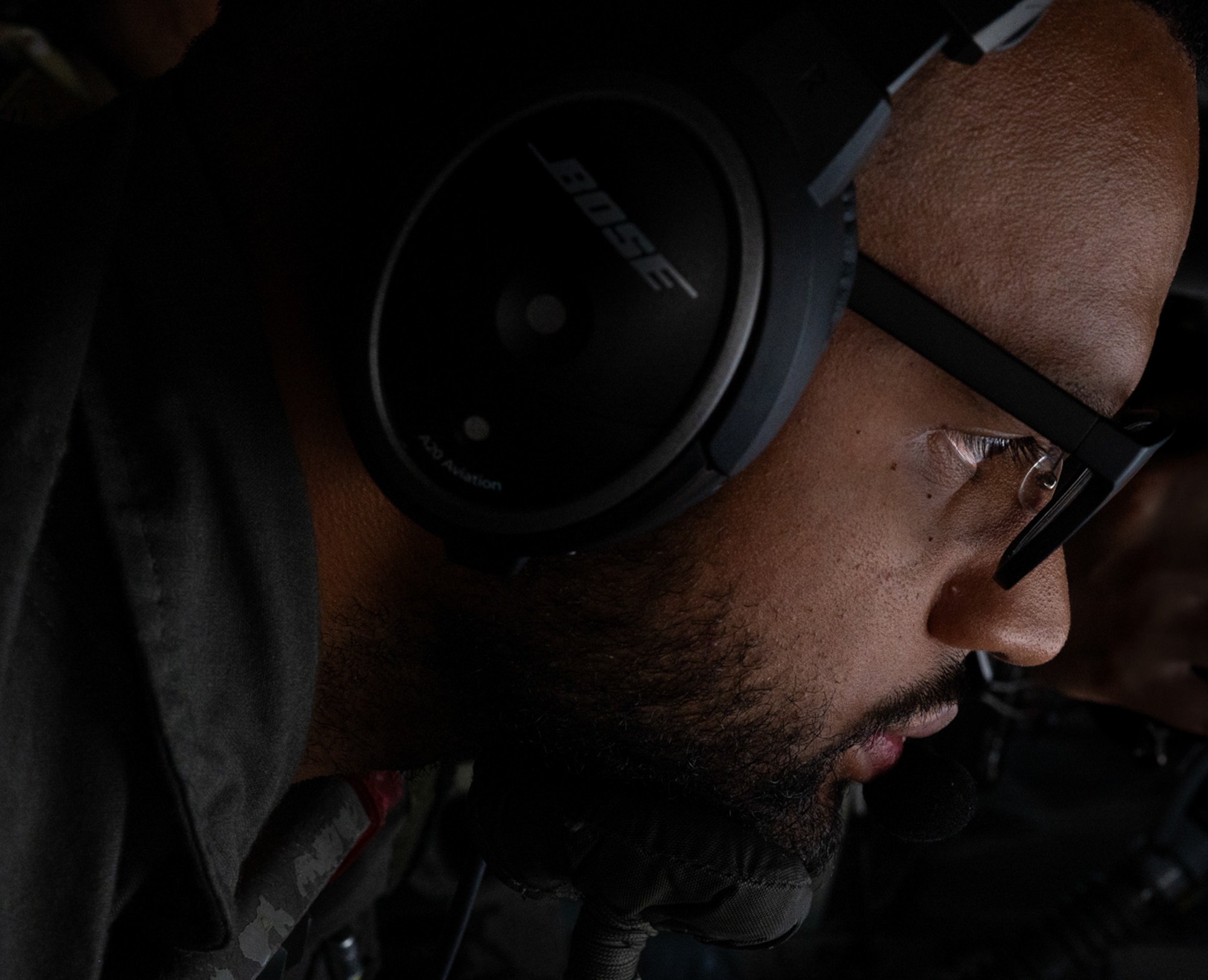 A man stares at refueling controls.