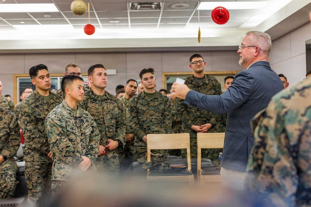U.S. Marine Corps Lt. Col. Chris Jackson, the oldest Marine present, delivers a speech to fellow Marines during a U.S Marine Corps 250th birthday cake cutting ceremony at United Service Organizations on USAG Camp Humphrey’s, South Korea, Nov. 7, 2025. Founded on November 10, 1775, the United States Marine Corps has served our nation honorably in every clime and place for 250 years. Throughout 2025, Marines across the globe will celebrate the 250th birthday of the Corps, commemorating service, sacrifice, and priding themselves on living ‘Semper Fidelis’ or ‘Always Faithful’ to their nation and to each other. (U.S. Marine Corps photo by Cpl. Simon Saravia)