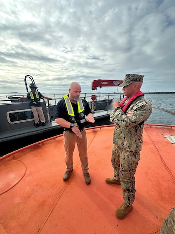 RDML Bresnihan inspects a Single Point Mooring and receives operational details about its role in supporting warfighters’ fuel requirements in Japan.