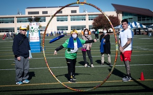 A participant throws a frisbee during the 46th Annual Kanto Plains Special Olympics at Yokota Air Base