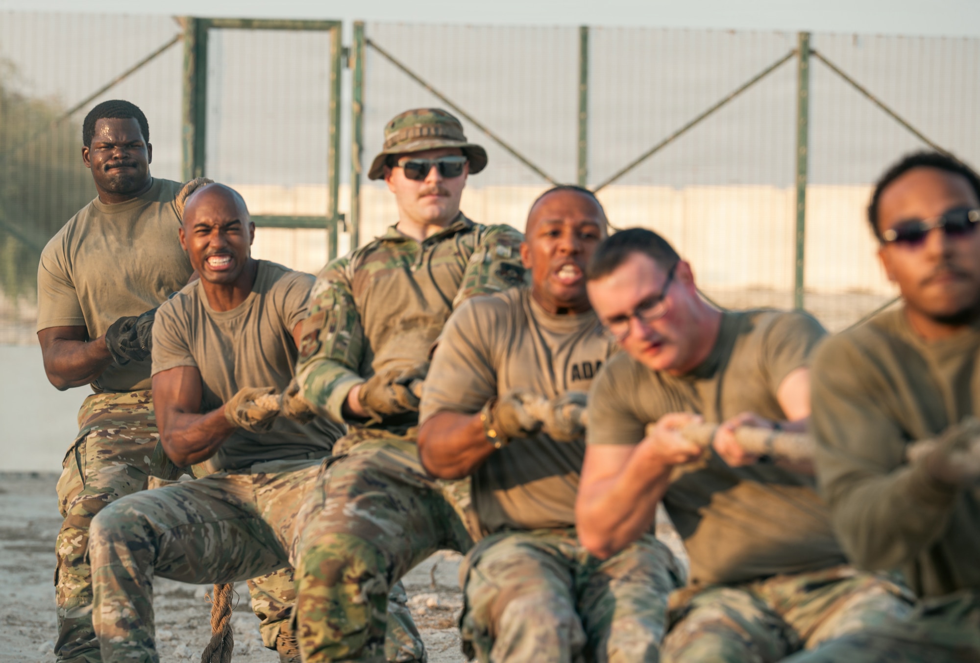 People compete in tug of war competition.