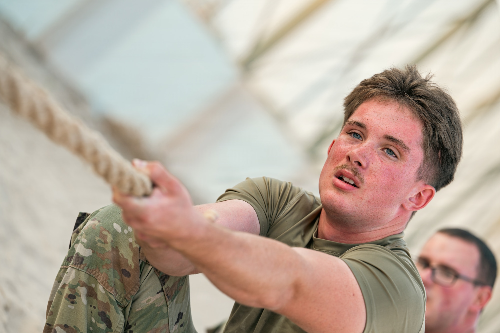 People compete in tug of war competition.