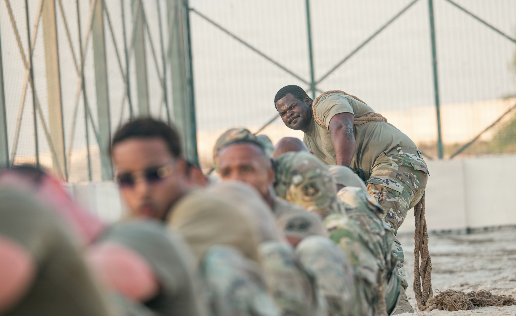 People compete in tug of war competition.