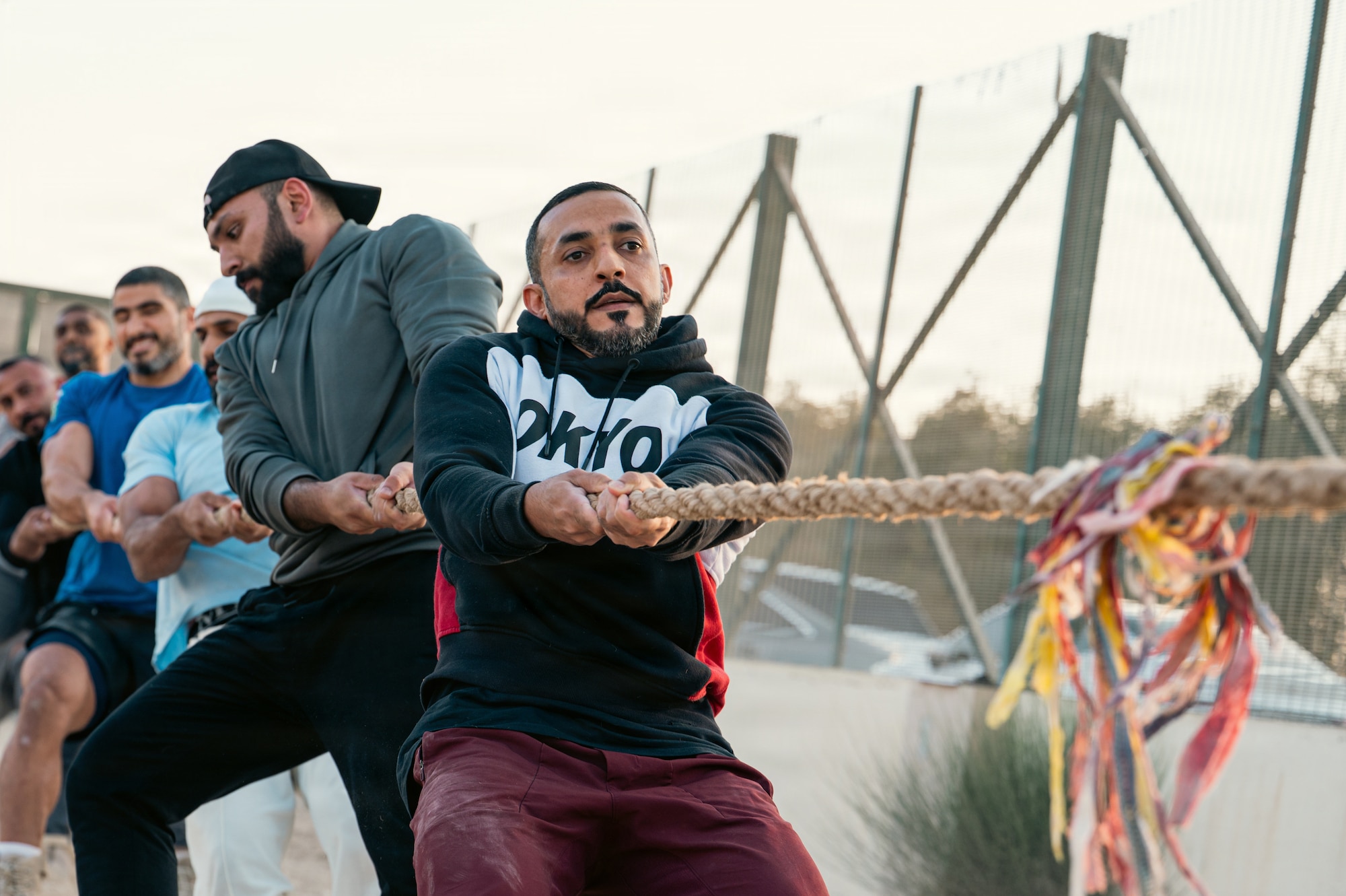 People compete in tug of war competition.